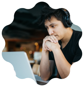A man staring at a computer